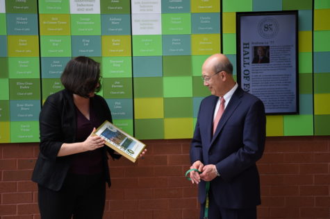 Dr. Andrew Lo ’77 was inducted into the Bronx Science Hall of Fame on June 2nd, 2023. Pictured is Principal M. Rachel Hoyle presenting him with a celebratory plaque to honor the achievement. 