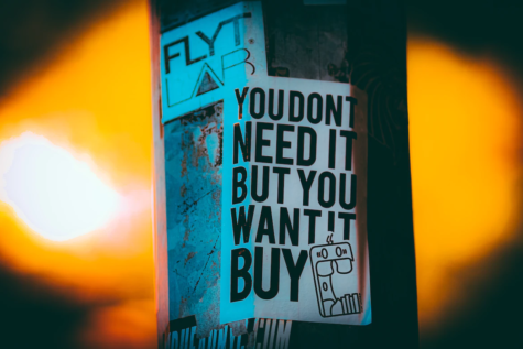 Whether it’s influencers starting off a TikTok by noting, “I’ve been seeing this product all over TikTok and had to try it,” or whether you’ve just seen the same ad everywhere, spending money for unjustifiable reasons is being normalized. (Jon Tyson / Unsplash)