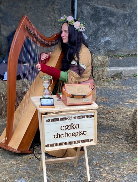 During the 2022 Fort Tryon Medieval Festival, visitors could sit on hay and enjoy the entertainment of musicians and storytellers. With all of the commotion of the festival, these small performances provided a peaceful intermission. 