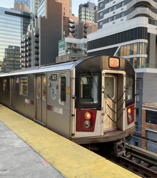 Here is a Flushing bound # 7 train at Queensboro Plaza. Following the implementation of CBTC on the Number 7 line, it has become one of the most reliable services on the New York City subway system. 
