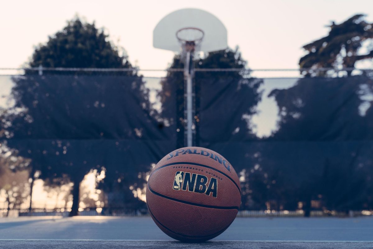 The NBA is amongst the top leagues in the sports world. It generated 10.58 billion dollars in revenue and averaged 1.59 million viewers in the previous 2022-2023 season. 
(Photo Credit: Edgar Chapparo / Unsplash)