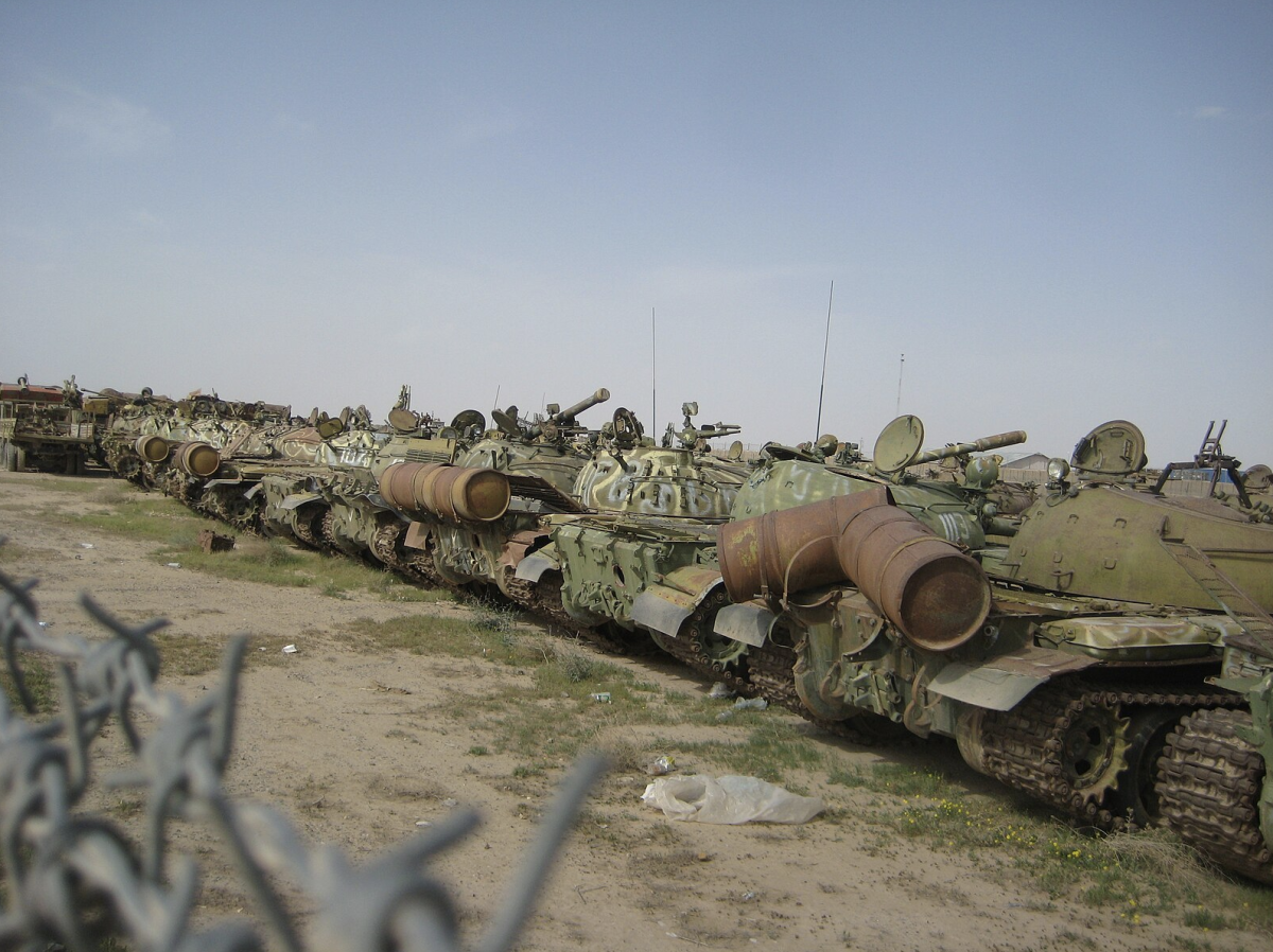 Pictured are numerous T-54-55’s (combat track vehicles) stationed outside the Kandahar Airfield in Afghanistan. (Photo Credit: Gregology, CC BY-SA 4.0 , via Wikimedia Commons)
