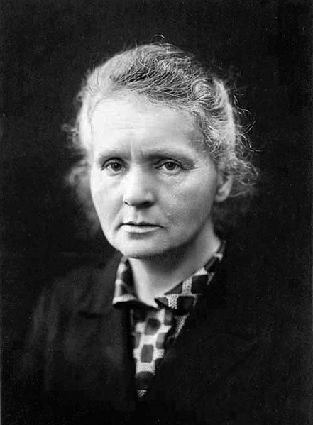 Here is Marie Curie, the trailblazing Nobel laureate in physics and chemistry, captured in a moment of scientific contemplation. She will forever illuminate the path for women in STEM. (Photo Credit: Henri Manuel, Public domain, via Wikimedia Commons)