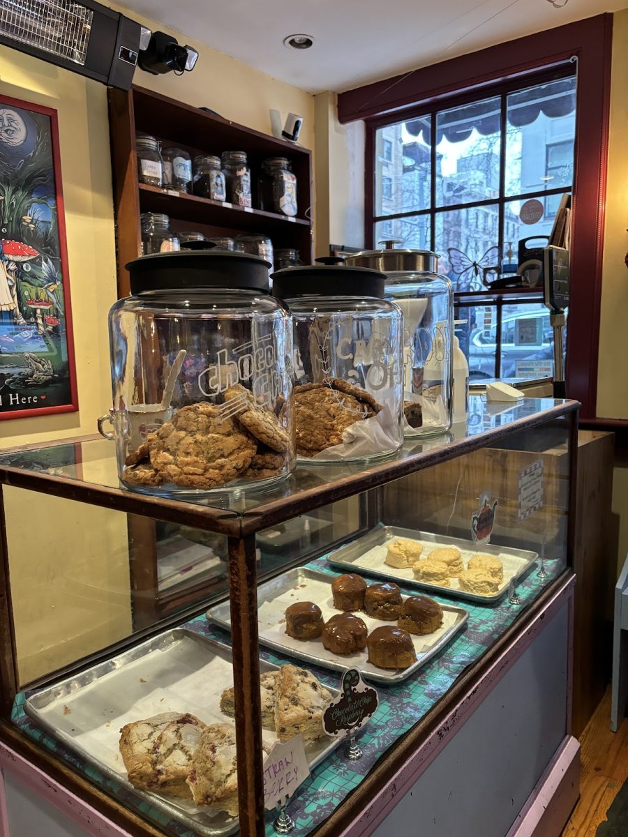 The front display at Alices Tea Cup enchants customers with jars of plate-sized cookies and a variety of scones. 