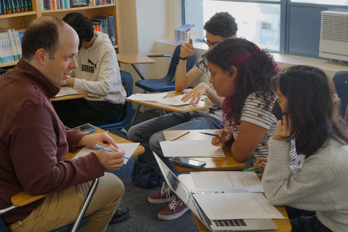 Mr. Zaharopol teaches a group of students beyond the confides of traditional schooling. [Photo Credit: Bridge to Enter Advanced Mathematics (BEAM). Used by permission of BEAM]