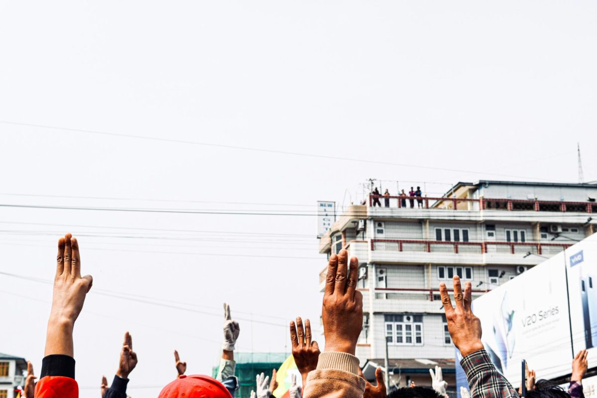 Originally introduced by ‘The Hunger Games’ protagonist Katniss Everdeen, the three-finger salute has found resonance among activists in Myanmar as a symbol of protest against the military coup in 2021. (Photo Credit: Pyae Sone Htun / Unsplash)