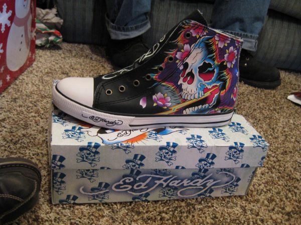 Here is a shoe of the Ed Hardy brand showing the unique style that Ed Hardy devoted his life to mastering and which has since gone mainstream. (Photo Credit: karindalziel, CC BY 2.0 , via Wikimedia Commons)
