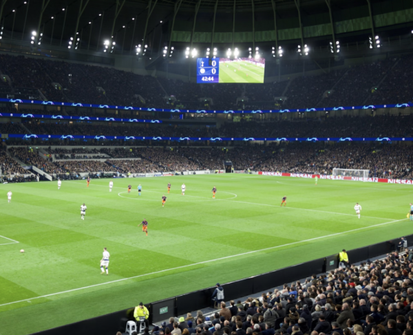 Nearing the end of the first half, two teams continue to face it off at the Tottenham Hotspur Stadium in London, England. (Photo Credit: Tim Bechervaise / Unsplash)