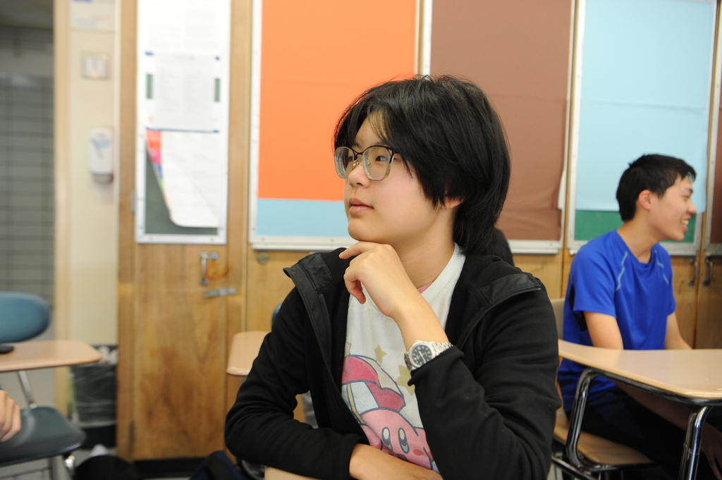 A student ponders a question in Second Year Chinese.
