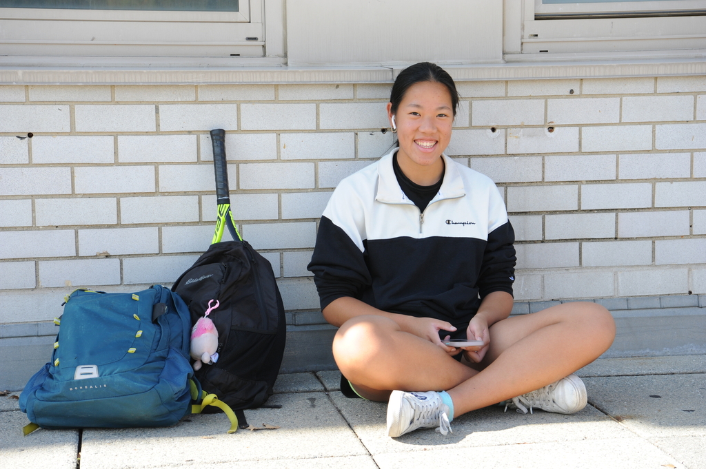Students often sit in the courtyard enjoying the warm weather before sports practice and after-school activities.
