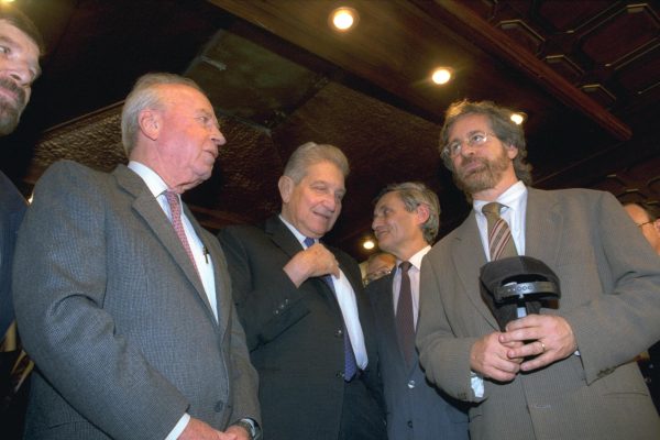 Director Steven Spielberg (right) engages with the Former President (middle) and Prime Minister (left) of Israel at the premiere of his film Schindler’s List. (Photo Credit: Government Press Office (Israel), CC BY-SA 3.0 , via Wikimedia Commons)
