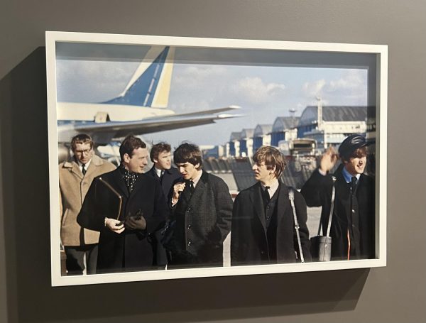 At the newly named JFK airport, Paul captures a snapshot of his bandmates and their team arriving in New York City for the first time -- the first meeting of American fans on their home base.