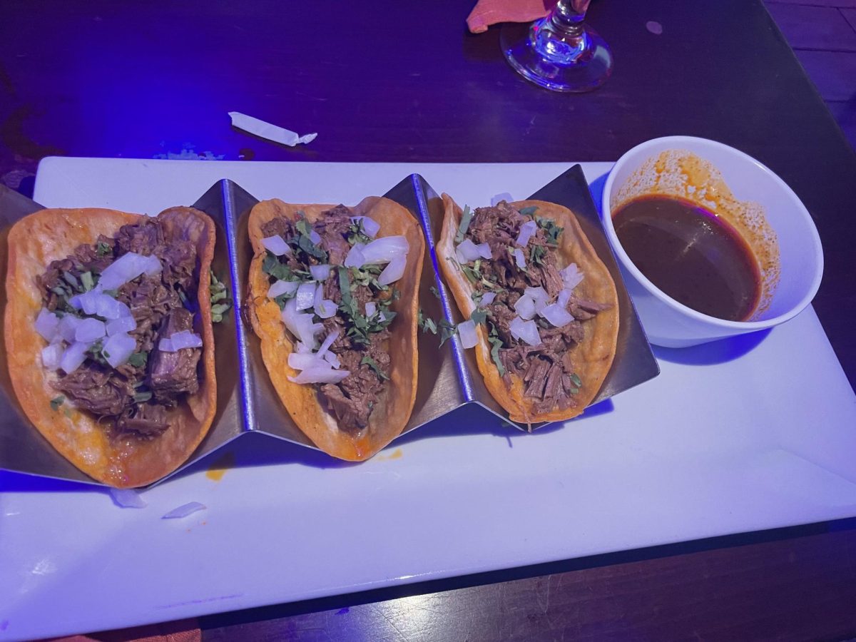 Pictured is a Cinco de Mayo menu special, Birria Tacos, a barbacoa beef taco served with onions, cilantro and consomme (broth).