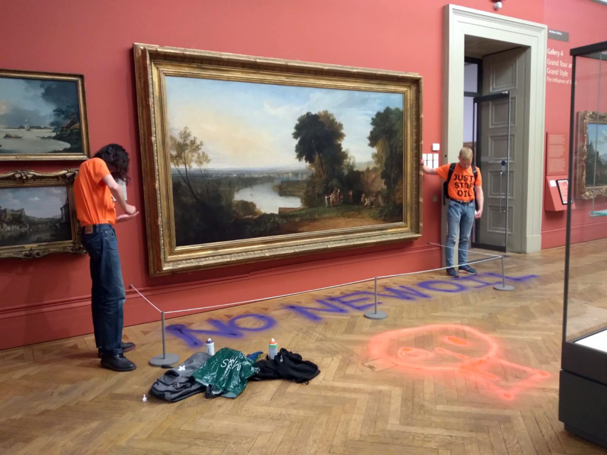 Just Stop Oil protestors often glue their hands to the frames of paintings in major art museums, a reminder that their movement is here to stay. (Photo Credit: Just Stop Oil, CC BY-SA 4.0 , via Wikimedia Commons)