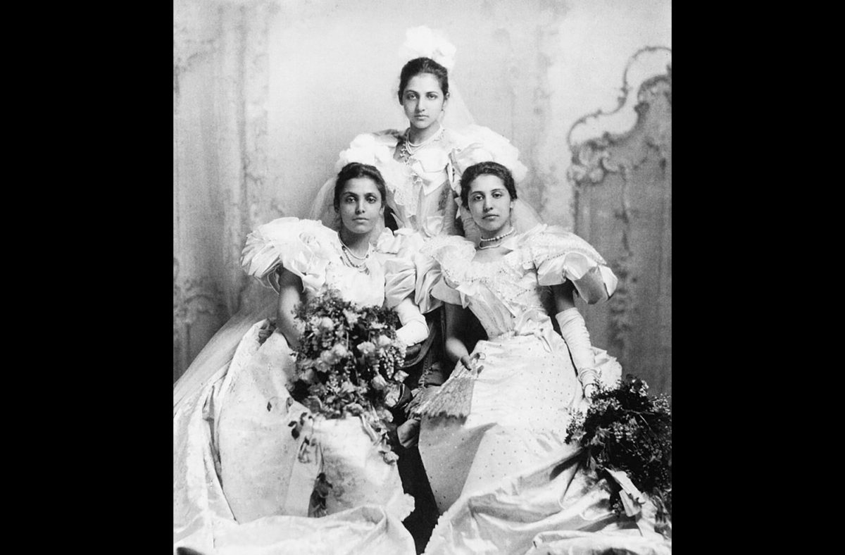 From left to right, Bamba, Catherine, and Sophia Singh were presented as debutantes in Buckingham Palace. They wore expensive silks and tulle, a testament to their regality. (Photo Credit: Public domain, via Wikimedia Commons)