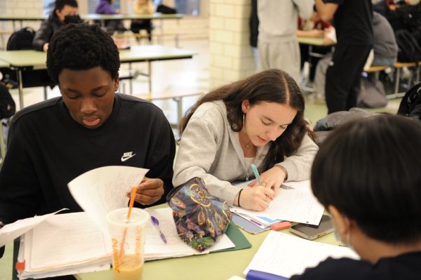 Students are often found studying for upcoming exams or doing homework in the cafeteria during their lunch or free periods.