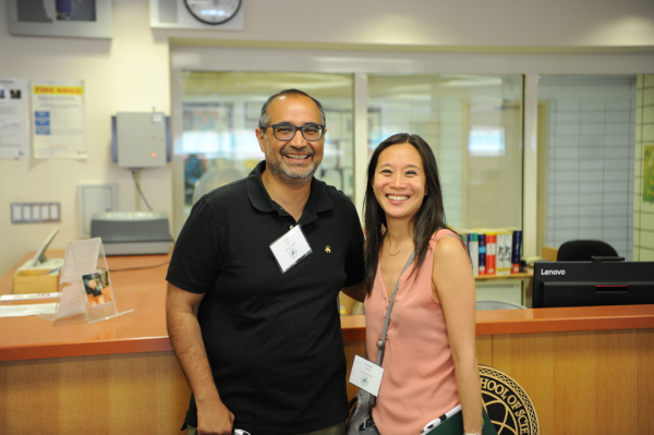 Two alumni reunite and share a moment of joy in the beloved Bronx Science library.