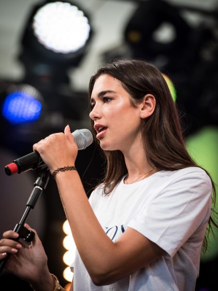 Here is a close-up look at Dua Lipa from her set at SWR3 New Pop Festival 2016. This performance landed a month after she released the critically acclaimed single, Blow Your Mind (Mwah). The song would go on to win a Gold certification in Italy and the United States while reaching Platinum in Canada and the United Kingdom.
(Photo Credit: Harald Krichel, CC BY-SA 3.0 , via Wikimedia Commons)