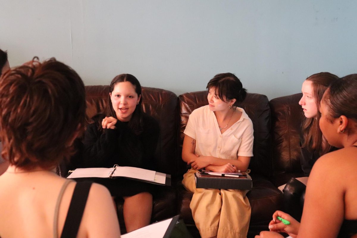 In+rehearsal%2C+playwright+Liliana+Giselle+explains+their+notes+to+the+actors+of+their+play%2C+Nietzsche+Walks+Into+a+Bar.%0A