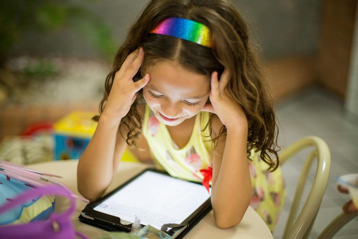The recommended screen time for children aged 5 and up is around two hours. (Photo Credit: Patricia Prudente / Unsplash)