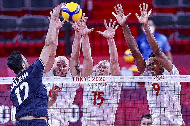 Here%2C+the+players+of+Poland+in+the+2020+Summer+Olympics+utilize+their+impressive+teamwork+against+Iran.+%28Photo+Credit%3A+MojNews%2C+CC+BY+4.0+%2C+via+Wikimedia+Commons%29