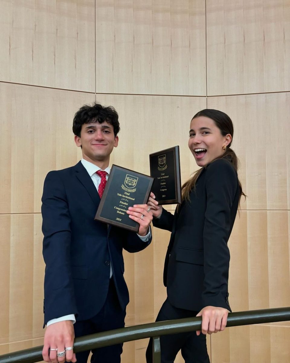 Christopher Procaccino '25 and Siena Ruske '26 pose with their plaques after competing in the final round of the 2024 Yale Invitational.