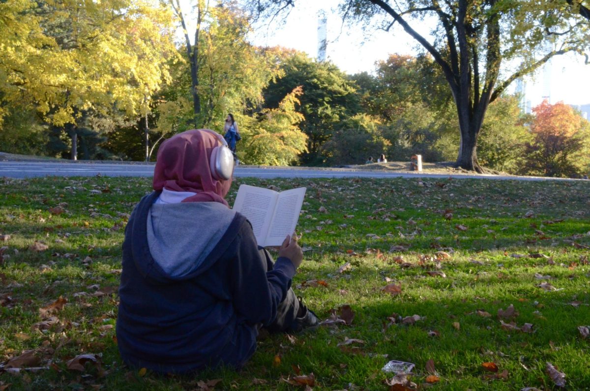 My cousin, Anisha Tarafder, enjoys a peaceful moment at Central Park with a good book in hand, taking a break from her social media feed.