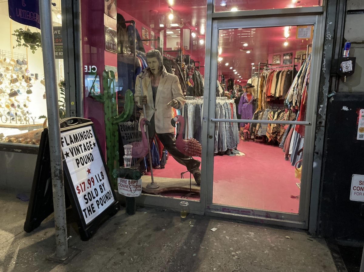 The Elvis Presley statue, the big sign announcing clothes are 17.99 per pound, and the neon pink walls are all factors drawing thrifters into Flamingo’s Vintage Pound with high hopes. The store ended up being as loud and impressive as it looks. 
