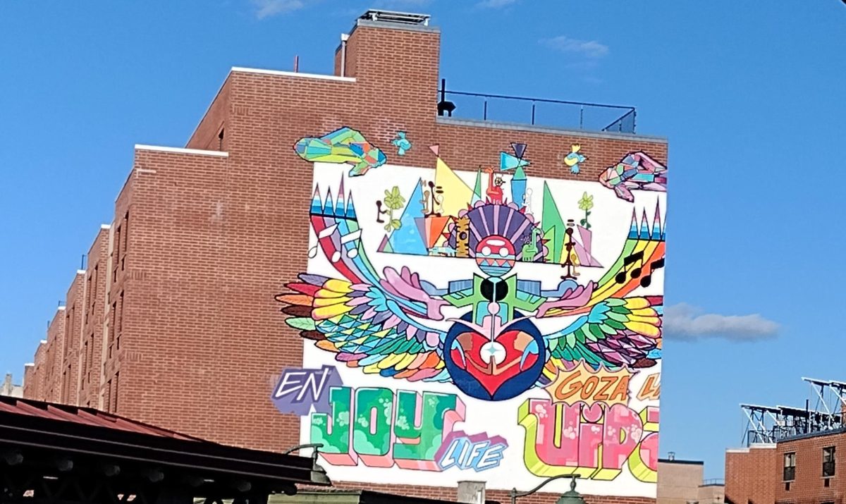 This is one of the many murals on the side of a building. The text reads, “Enjoy Life.” It can be found near the Prospect Avenue and Westchester Avenue train station in the South Bronx.