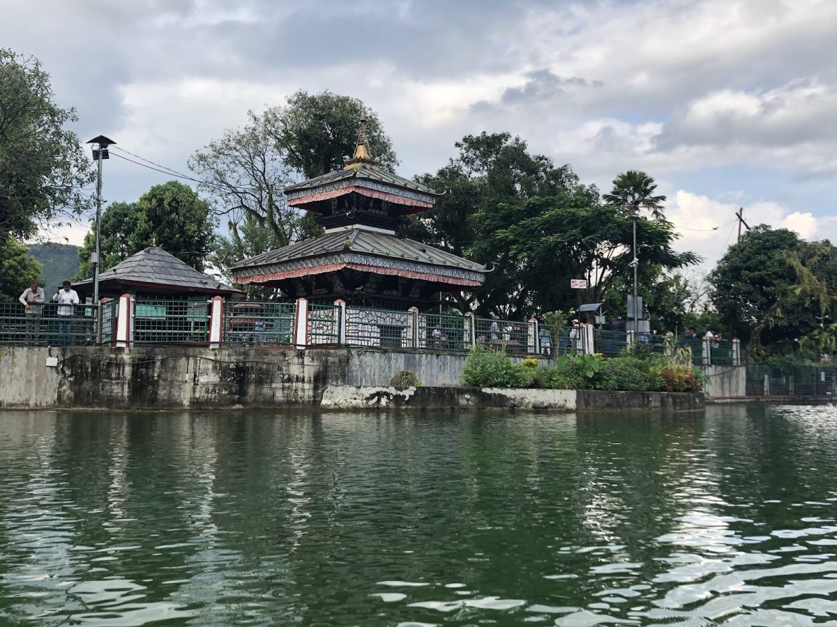 Showcased is the natural scenery of one of the many Buddhist religious temples in Nepal, located in Phewa Lake in Pokhara. The Tal Barahi temple is situated in the middle of the lake which entrances visitors, given its creative placement. 