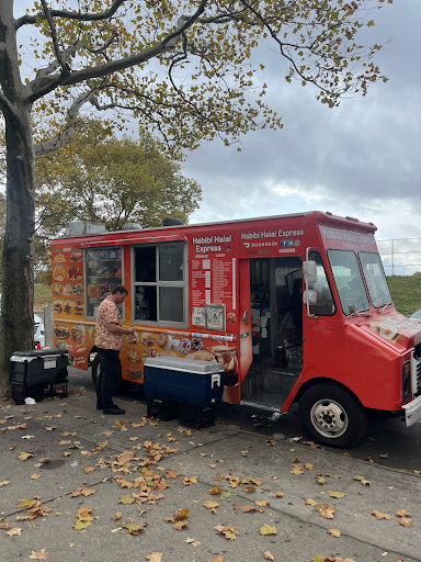 Ned, who runs Ned’s food truck, a food staple in the Kingsbridge Heights section of the Bronx, parks his newly wrapped truck in front of The Bronx High School of Science entrance. 