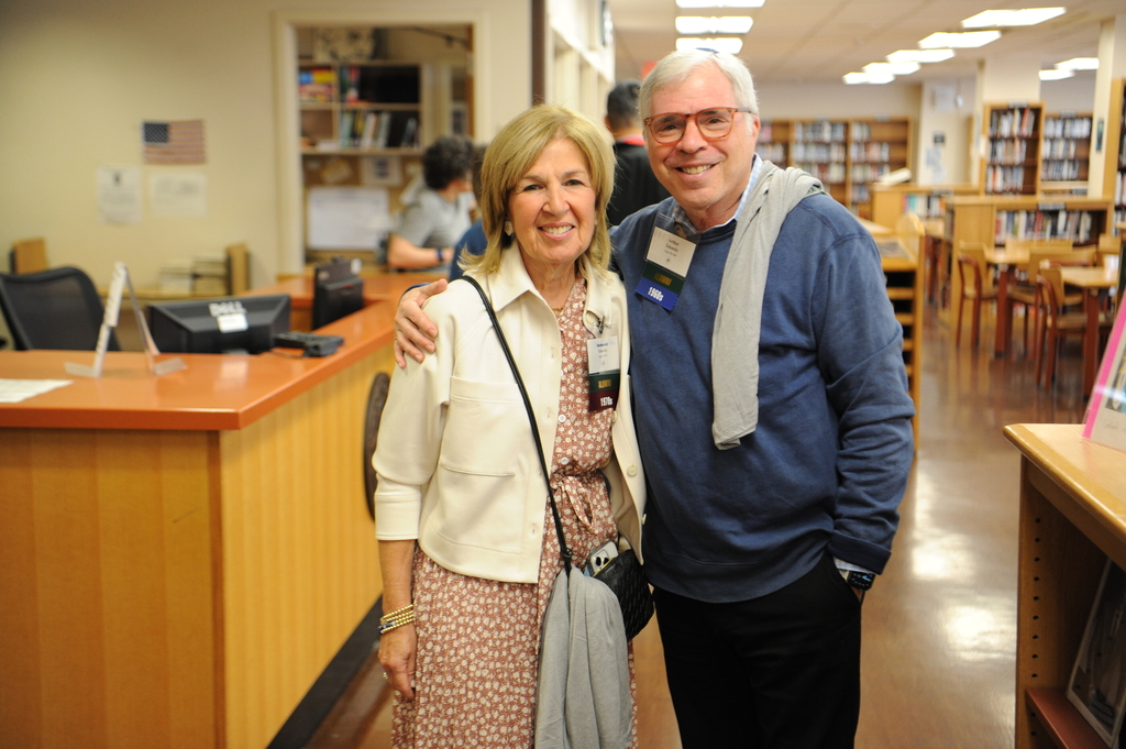 These Bronx Science alumni share a joyful moment in the library. The woman pictured to the left is from the Class of 1971, while her husband (pictured to the right) is from the Class of 1969.