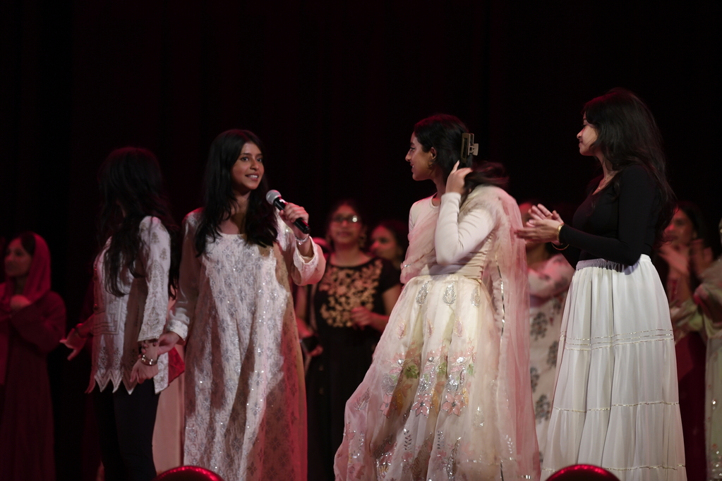 Pictured from left to right are Soha Chhapra ‘26, Adrita Risha ‘25, Amirah Rahman ‘26, and Tisha Ray ‘26 as they make their closing remarks and introduce the next year's leadership for the NASHA of Culture group. Adrita Risha ‘25, remarked on the overall performance, stating that, “We had some technical difficulties in the beginning, but I think they all resolved themselves throughout the show as people got to appreciate the dazzling performances.”