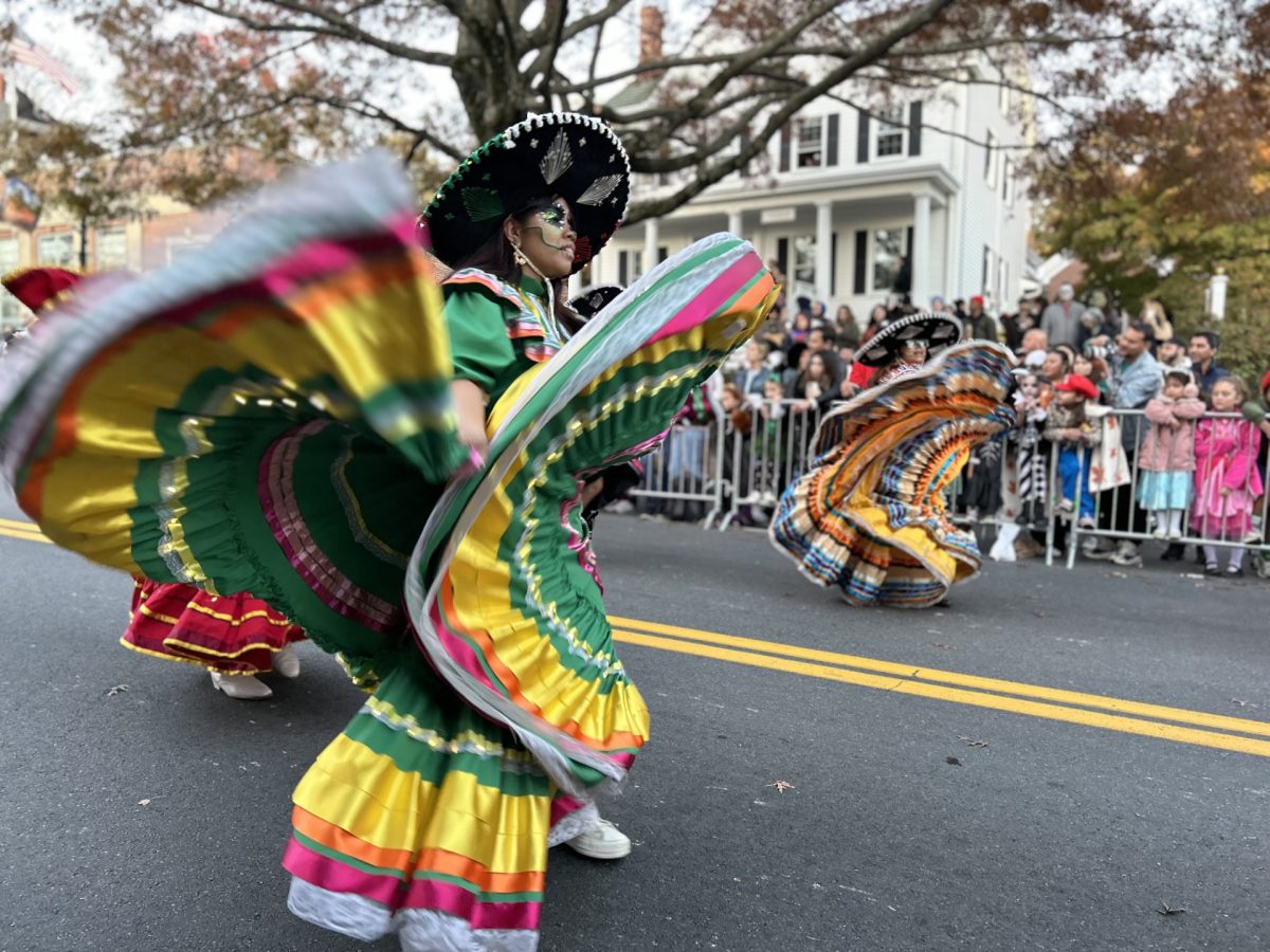 A group of Ballet Folklorico dancers honors Día de los Muertos at the 2024 Tarrytown Halloween Parade with a classic performance. 