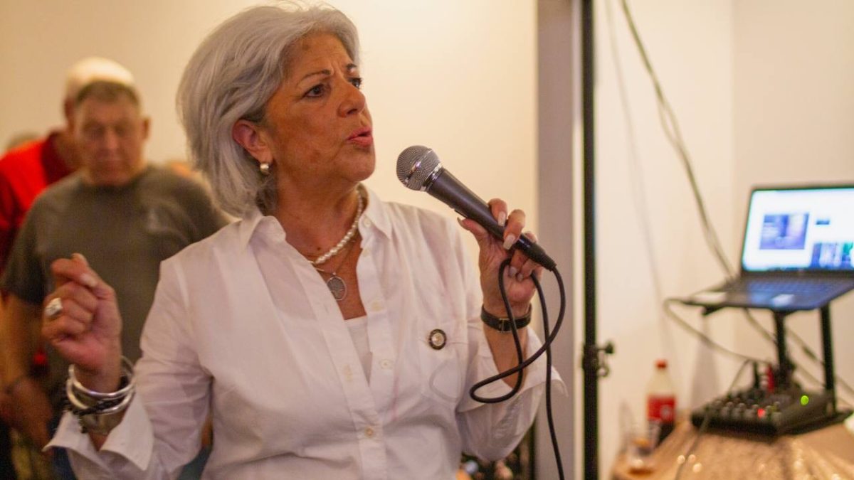 Here, Councilmember Vicki Paladino speaks to attendees at a community event, addressing local issues that are important to residents of her district. (Photo Credit: photo provided by the Office of Councilmember Vicki Paladino; reprinted by permission)