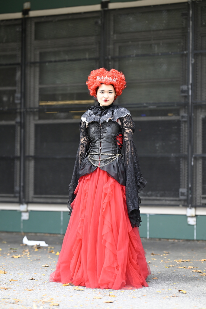 Chloe Li ‘26 had a costume inspired by the Red Queen from the movie Alice Through the Looking Glass, without the actual “Off with their heads!” part. Li reused her junior prom dress and pieced it together with the red wig, corset, and lace shrug she purchased online. As she said, “I wanted to do something extravagant for Halloween this year because I am a senior.” 