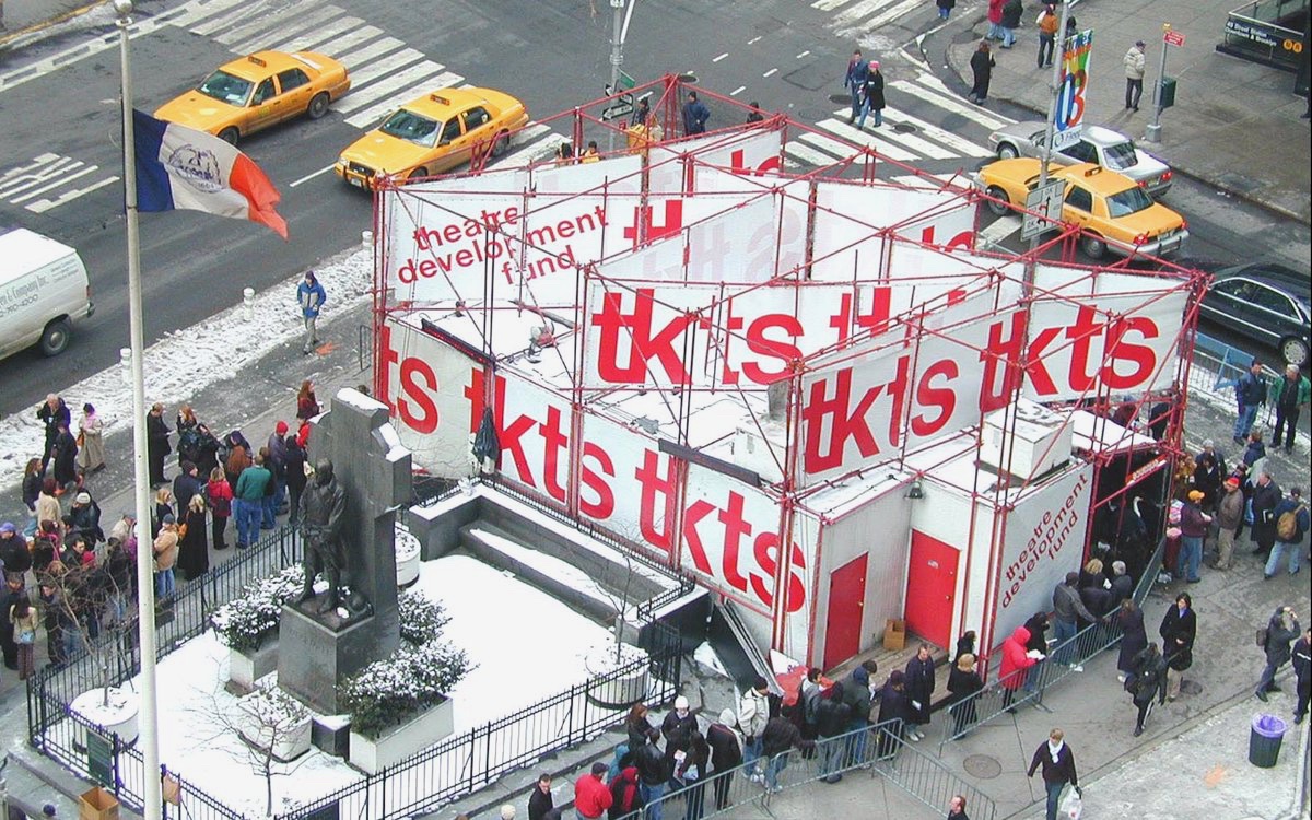  Both the original and current TKTS booths have been located at 47th Street and Broadway in Manhattan, adjacent to the statue of Francis Duffy Patrick. (Photo Credit: Robert Mayers; used by permission)