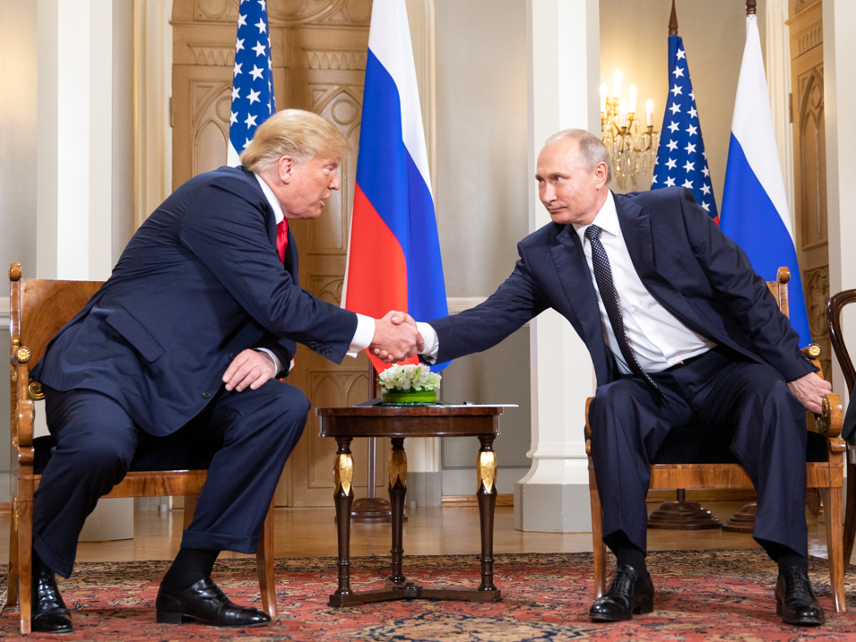 In 2018, Donald Trump and Vladimir Putin held a publicized meeting for the third time. With their intense handshake, this image signifies the level of diplomacy that the two leaders have shared for over seven years. When we look at how Trump and Putin are interacting today, and how they are choosing to present their relationship, it’s important not to forget that they have a history – a good history. (Photo Credit: The White House from Washington, DC, Public domain, via Wikimedia Commons)