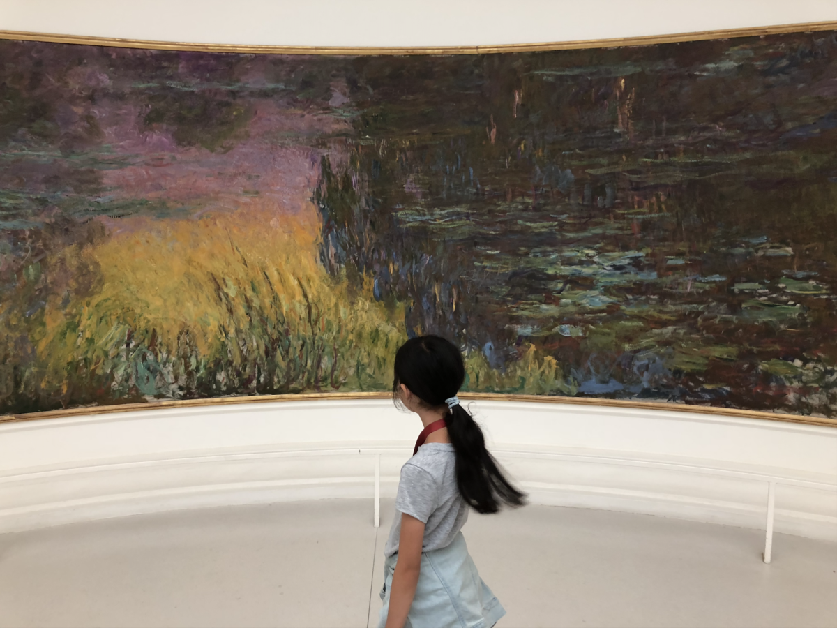 This painting is entitled ‘Soleil Couchant,’ which translates to 'Setting Sun.' This is one of my personal favorites and the most vibrant painting in the exhibit.
