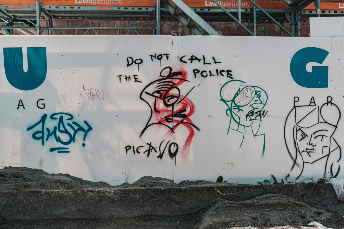 Graffiti is a common crime of vandalism amongst teens, stemming from their need to express themselves. (Photo Credit: Claudio Schwarz / Unsplash)