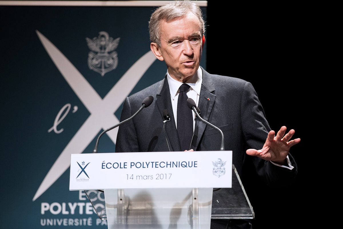 This image shows Bernard Arnault, the CEO of LVMH and the 7th richest man in the world, according to Forbes, with a net worth of 171 billion dollars. Given he turned the company from something on the verge of collapse to one of, if not the most successful luxury goods brand of all time, the massive amount of personal profit he has made from this is not at all surprising. (Photo Credit: Jérémy Barande / Ecole polytechnique Université Paris-Saclay)
