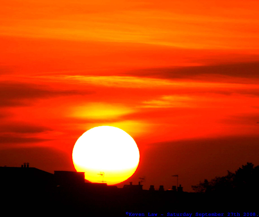 The iconic sunset from 'Apocalypse Now' is used for its striking and vibrant red colors, signaling the violence and depravity found in the war. (Photo Credit: Keven Law from Los Angeles, USA, CC BY-SA 2.0 , via Wikimedia Commons)