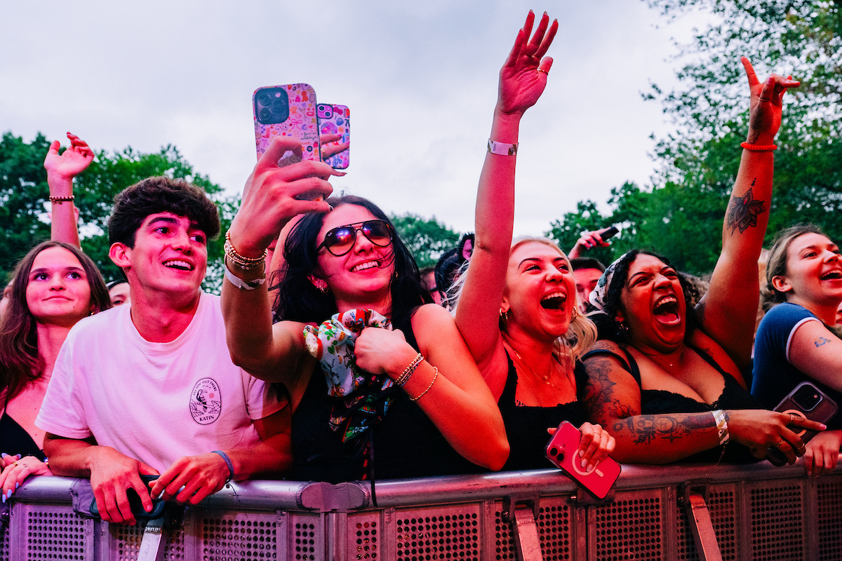 Festivalgoers raise their hands and phones, cheering excitedly for their favorite acts. (Photo Credit: Gov Ball, Taylor Regulski; reprinted by permission)